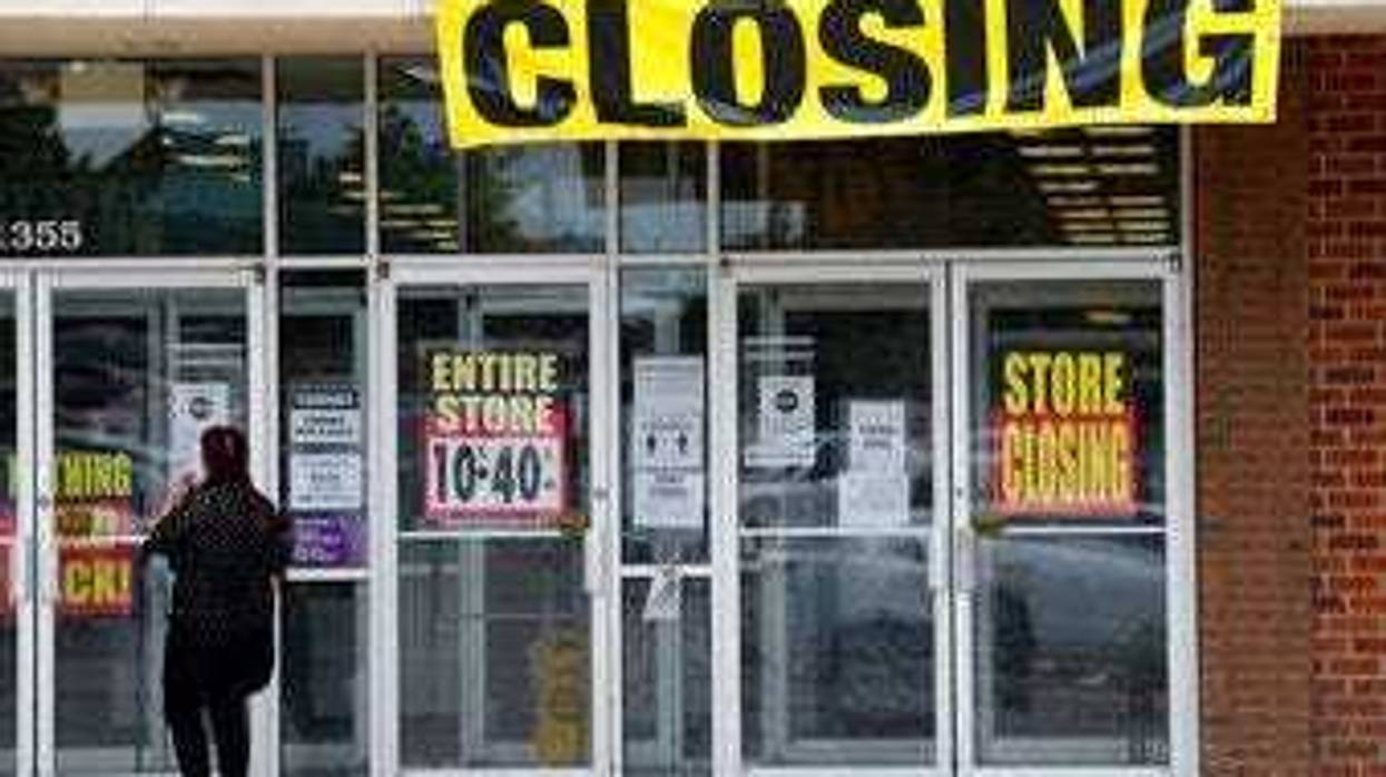 A woman walks into a closing Gordmans store, Thursday, May 28, 2020, in St. Charles, Mo. Stage Stores, which owns Gordmans, is closing all its stores and has filed for Chapter 11 bankruptcy. (AP Photo/Jeff Roberson)
