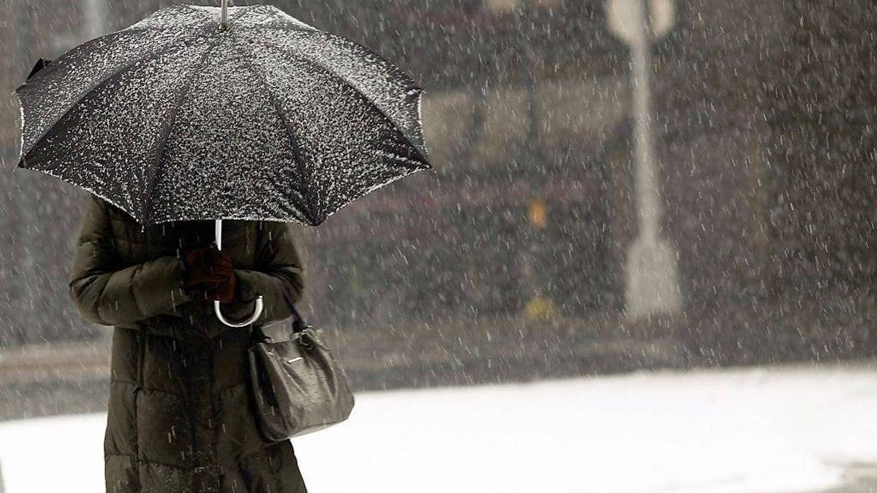 A woman walks through the snow on March 5, 2015 in the Brooklyn borough of New York City.