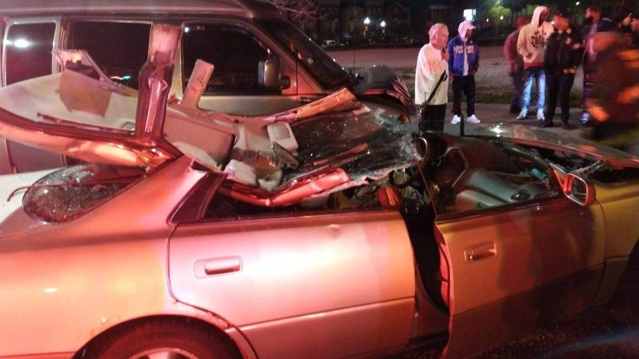 A woman was killed and at least three other people were injured in a crash Thursday night in West Town.