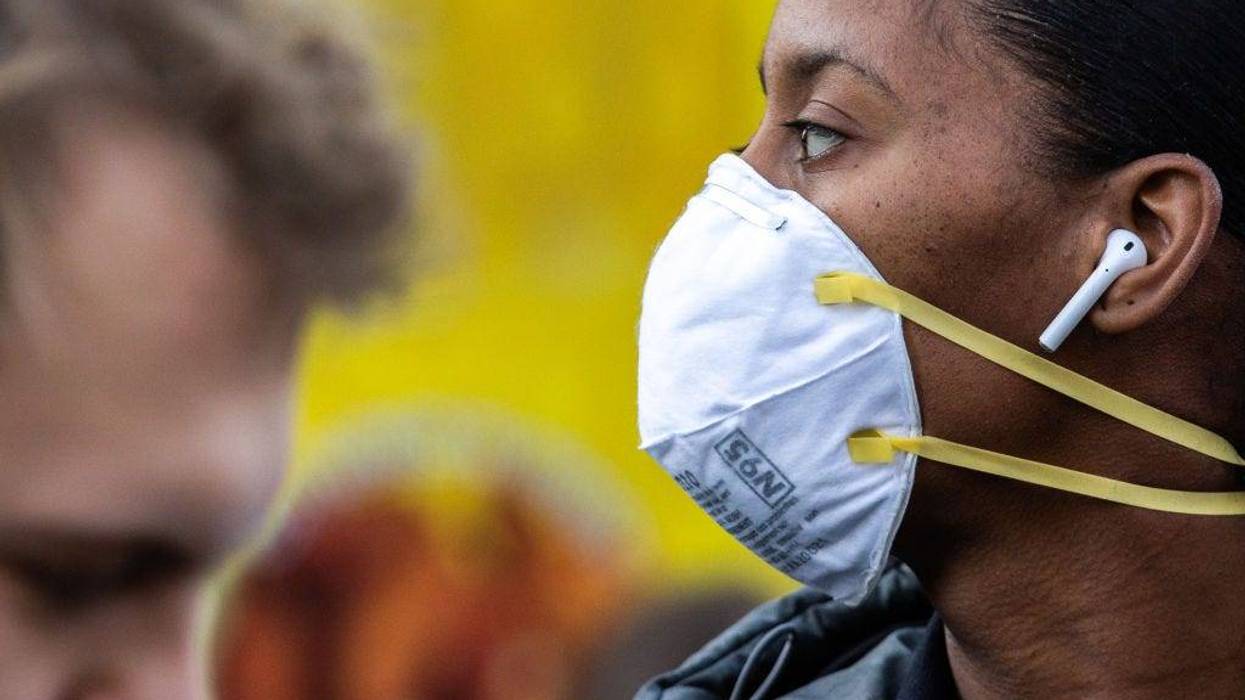 A woman wearing a protective mask is seen in Union Square on March 9, 2020 in New York City.