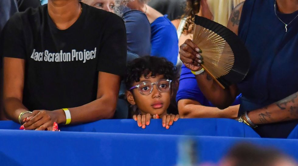A young girl awaits Kamala Harris at the buffer line during the campaign rally. Kamala Harris during a campaign rally in Wilkes-Barre, USA - 13 Sept (Photo by Aimee Dilger / SOPA Images/Sipa USA)