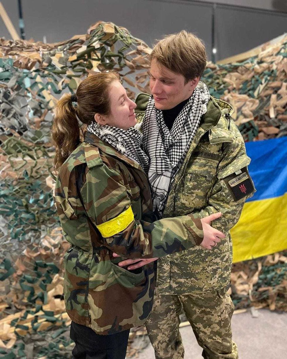 aArieva and Fursin embrace amid the Russian invasion this month