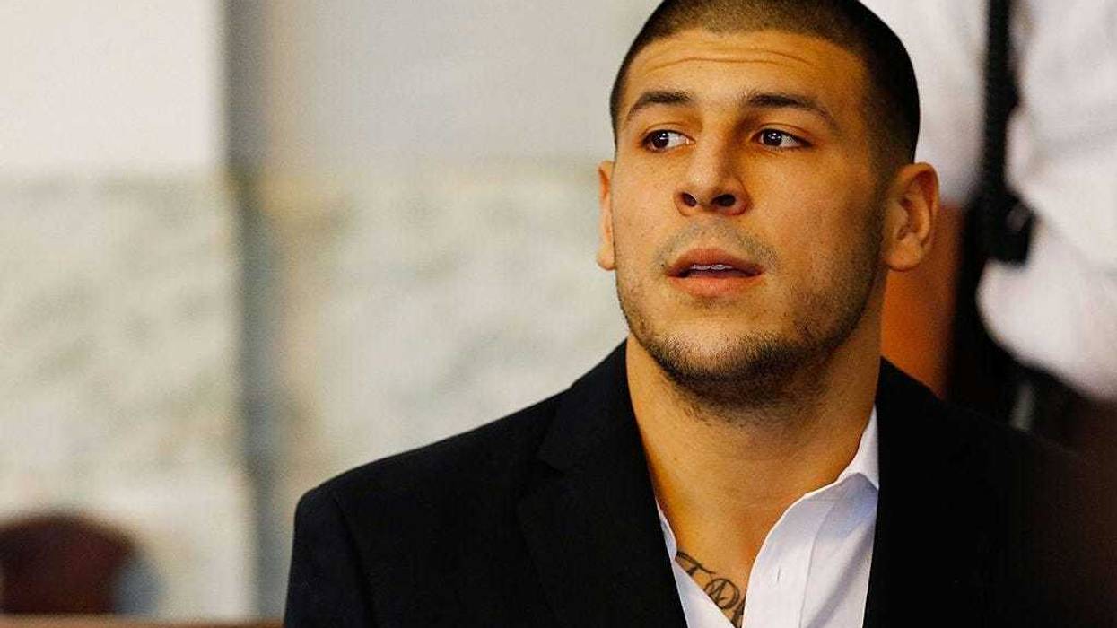 Aaron Hernandez sits in the courtroom of the Attleboro District Court during his hearing