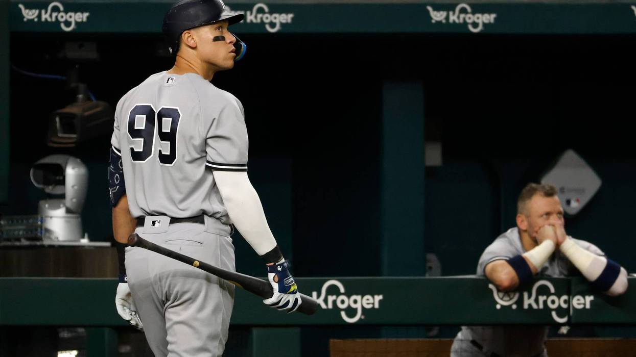Aaron Judge #99 of the New York Yankees looks on after striking out against the Texas Rangers during the eighth inning at Globe Life Field on Oct. 3, 2022, in Arlington, Texas. The Yankees won 3-1.