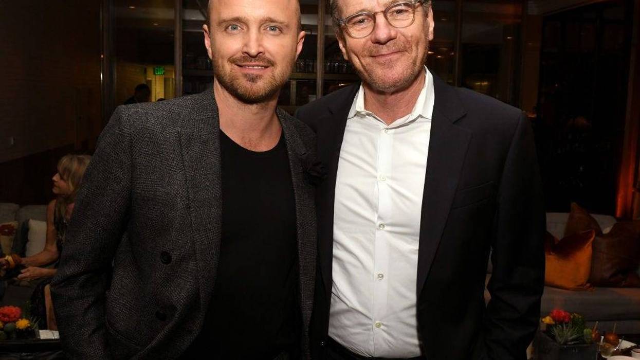 Aaron Paul (L) and Bryan Cranston pose at the after party for the premiere of Netfflix's "El Camino: A Breaking Bad Movie" at Baltaire on October 07, 2019