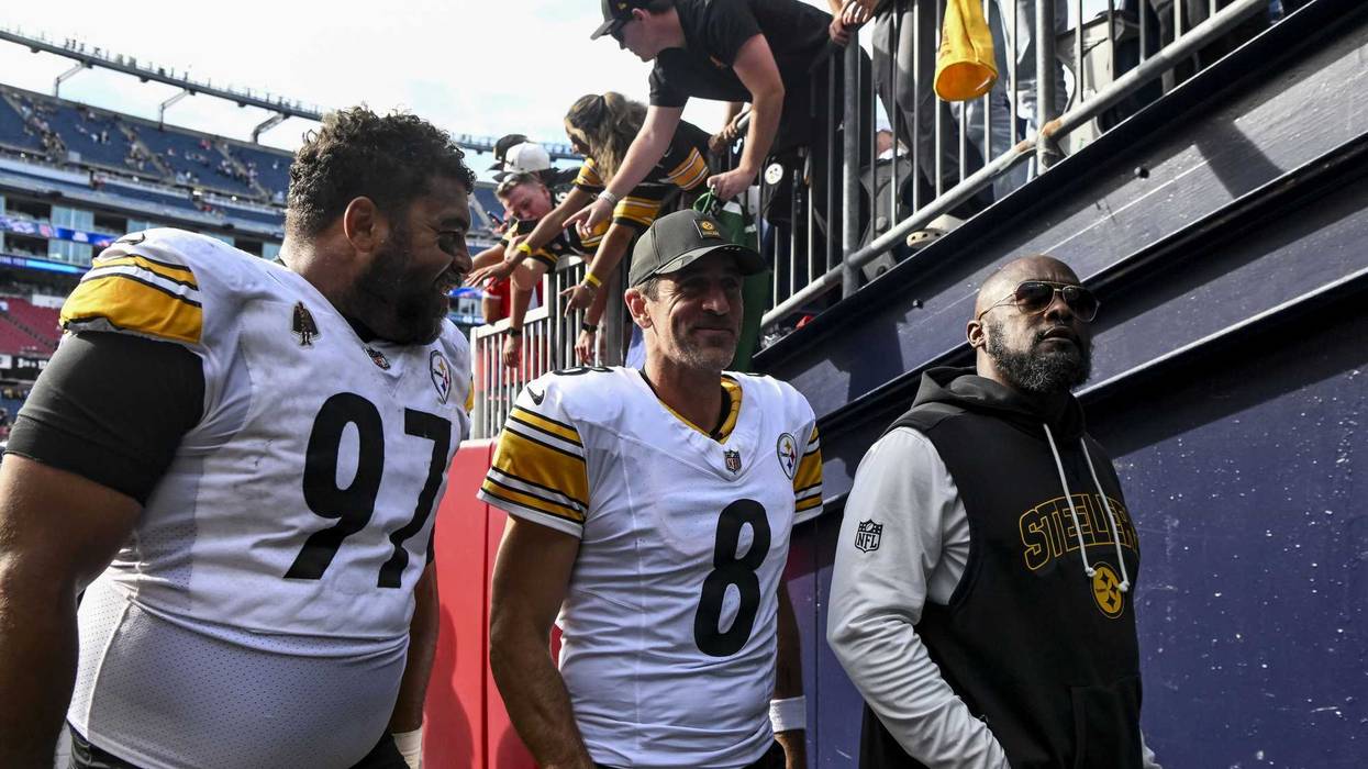 Aaron Rodgers Cam Heyward and Mike Tomlin walking together
