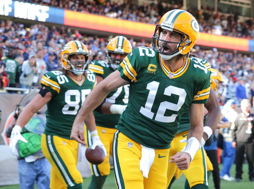 Aaron Rodgers celebrates a Packers TD