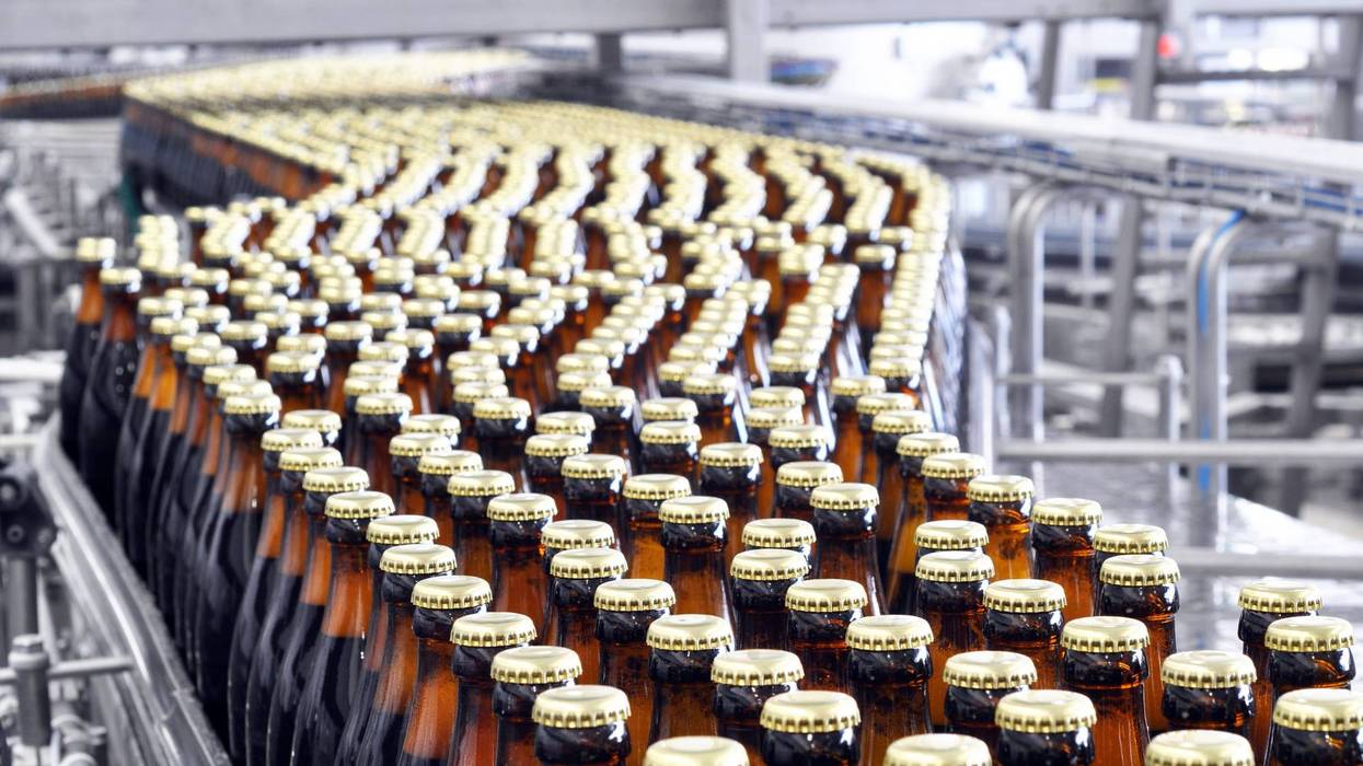 AB-InBev announced Friday that it is selling interest in a venture with a Turkish brewer operating in Russia and Ukraine