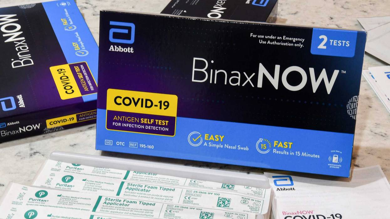 Abbott's at-home covid-19 rapid test kits are seen on display in Orlando.
