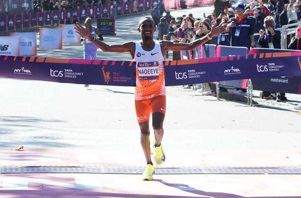 Abdi Nageeye of the Netherlands crosses the finish line to win the men