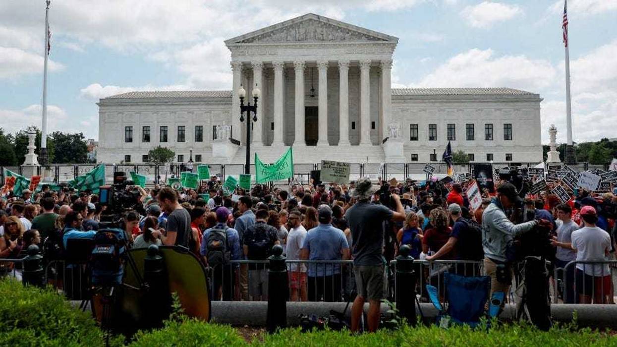 Abortion-rights and Anti-Abortion rights activists fill first street in front of the U.S. Supreme Court after the announcement to the Dobbs v Jackson Women's Health Organization ruling on June 24, 2022 in Washington, DC.