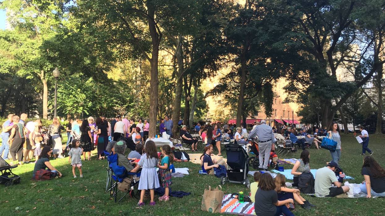 About 100 people gathered in Rittenhouse Square for a Rosh Hashanah celebration on Sunday.