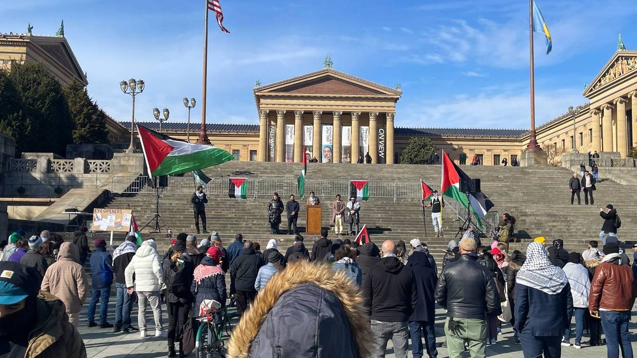 About 100 people gathering at the Art Museum steps for the Palestinian Day of Solidarity.