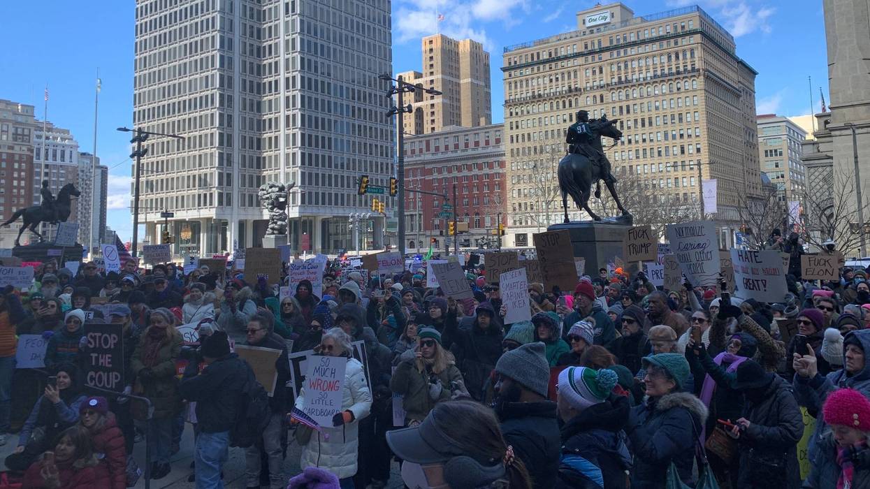 About 1,000 people gathered at City Hall on Presidents Day to protest recent actions taken by Donald Trump and Elon Musk.