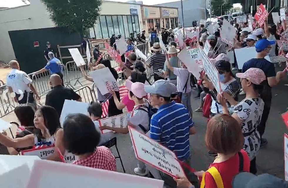 About 150 gathered in Bensonhurst, Brooklyn on Wednesday morning to protest the construction of a new homeless shelter.