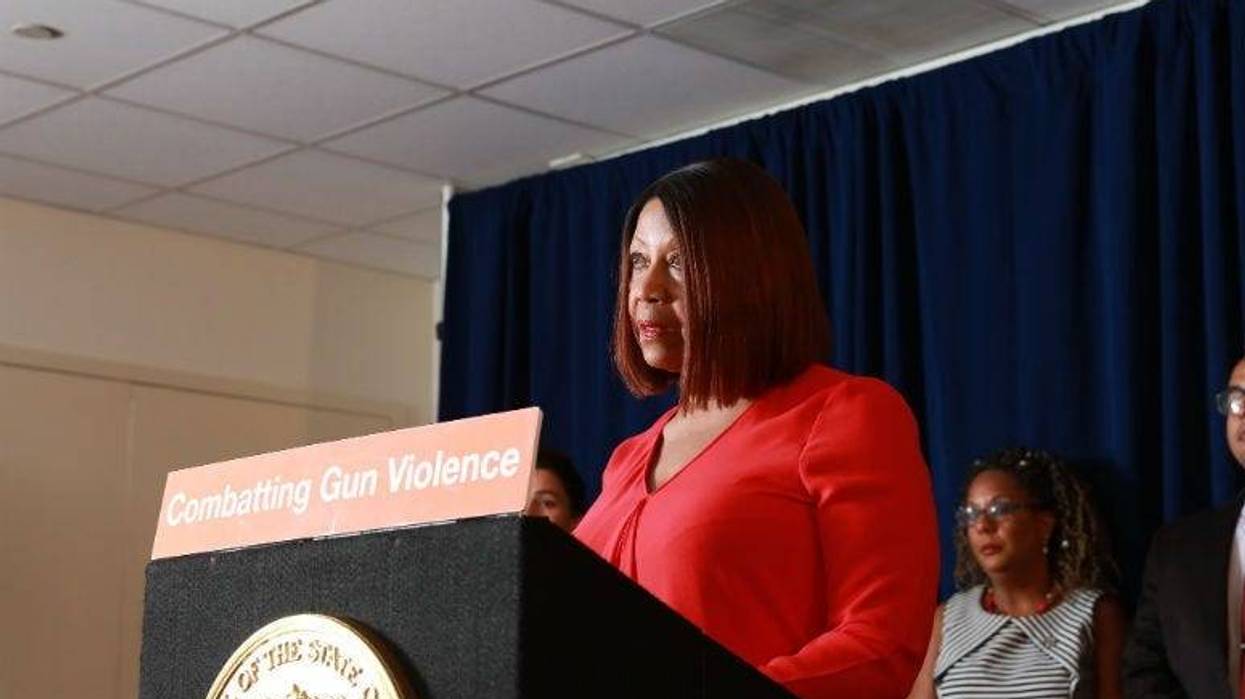 Acting Governor Sheila Oliver signs a package of gun bills in Trenton on Monday, August 5th, 2019.