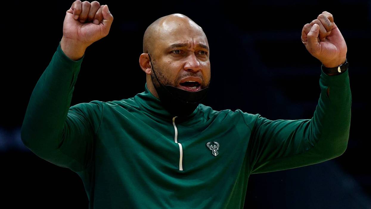 Acting head coach Darvin Ham of the Milwaukee Bucks reacts during the second half of the game against the Charlotte Hornets at Spectrum Center on January 08, 2022 in Charlotte, North Carolina.