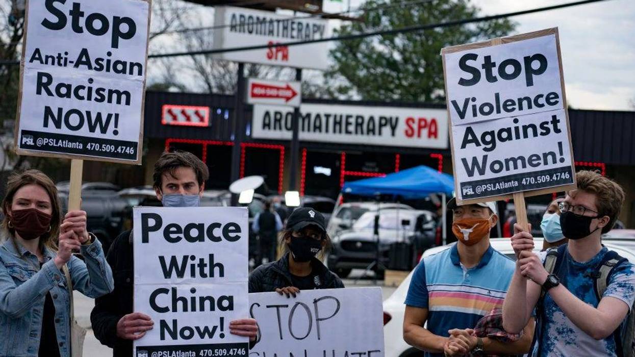 Activists demonstrate against violence towards women and Asian Americans