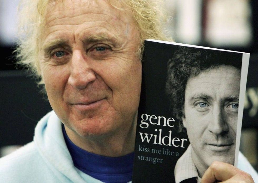Actor Gene Wilder poses as he signs copies of his autobiography "Kiss Me Like A Stranger", at Waterstone