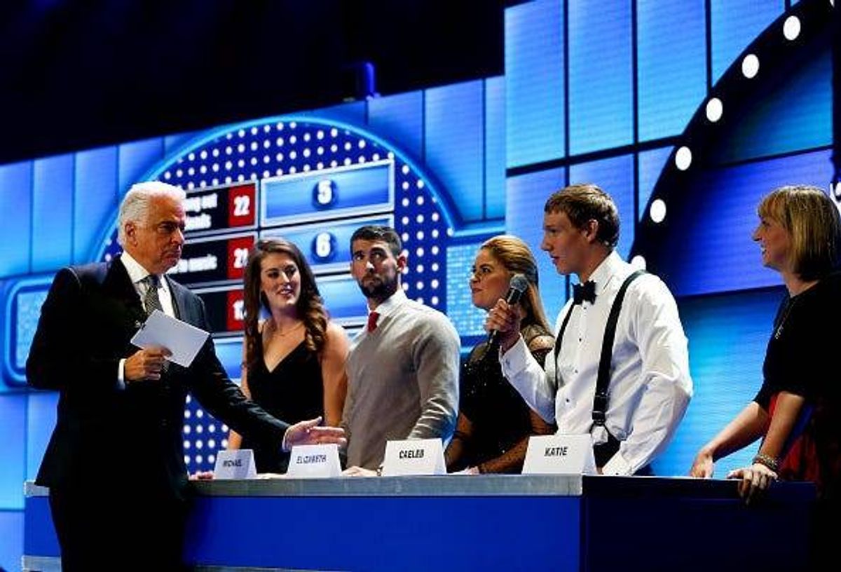 Actor John O'Hurley leads a game of Swimmer Family Feud.