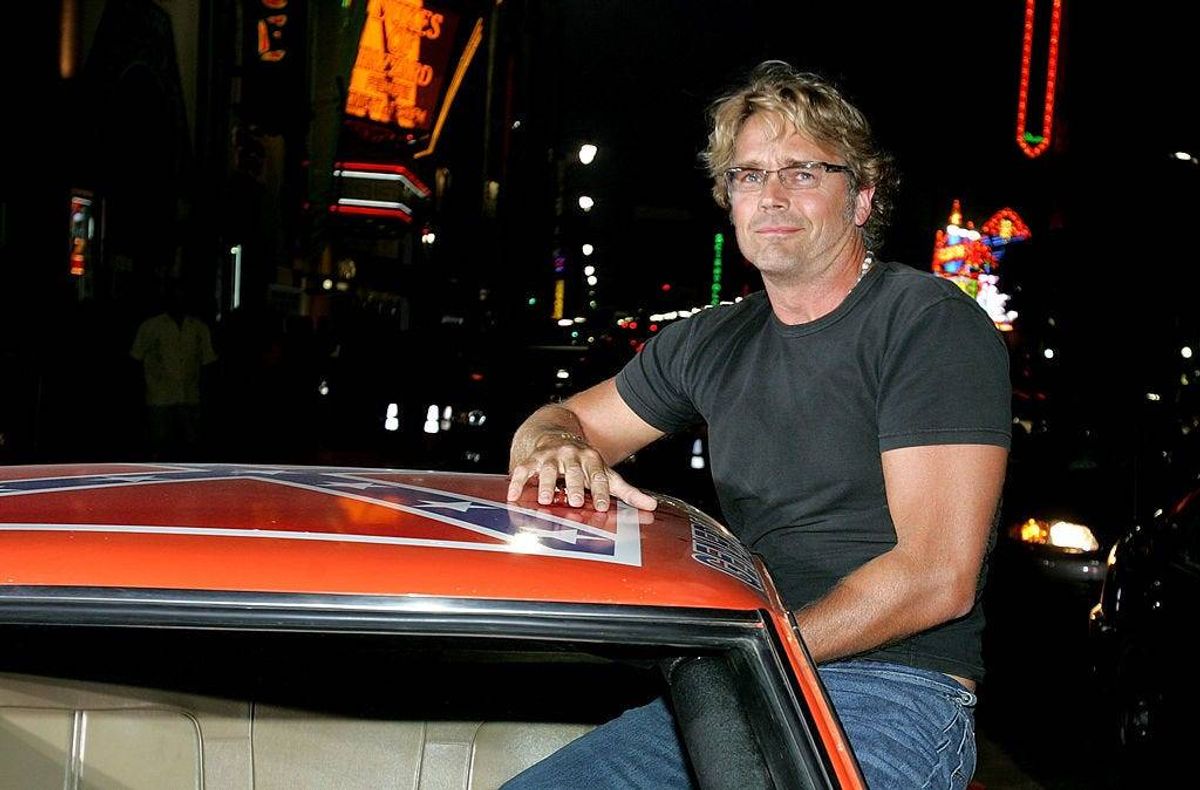 Actor John Schneider arrives at the Premiere Of "The Dukes of Hazzard" at the Grauman's Chinese Theatre on July 28, 2005 in Hollywood, California. (