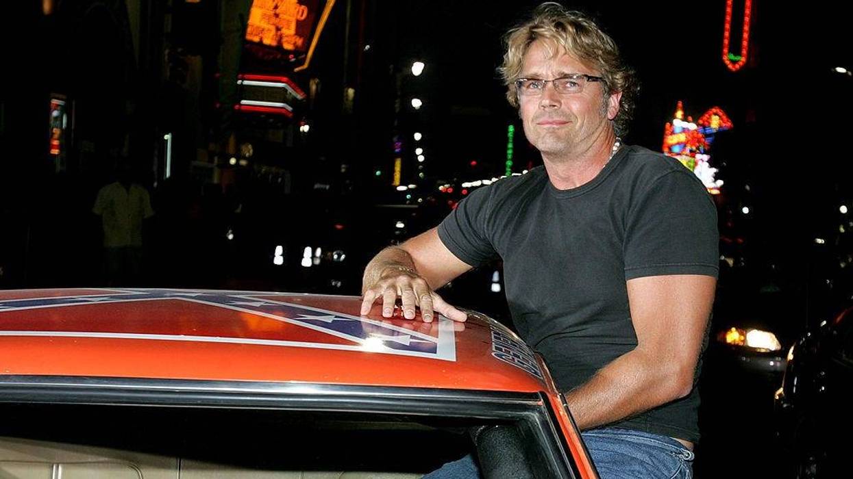 Actor John Schneider arrives at the Premiere Of "The Dukes of Hazzard" at the Grauman's Chinese Theatre on July 28, 2005 in Hollywood, California. (