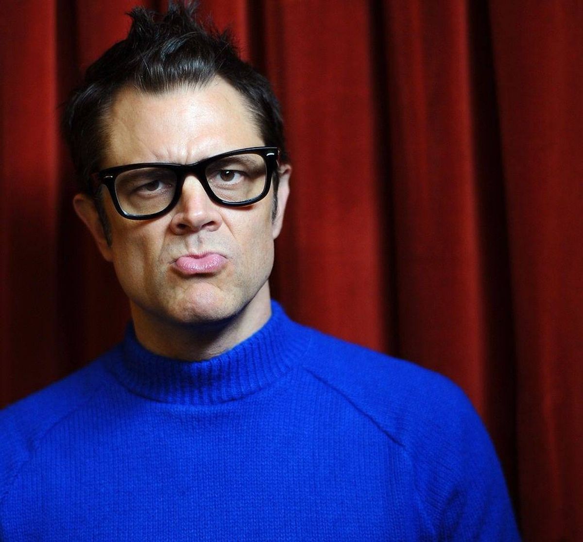 Actor Johnny Knoxville poses for photo, 2012