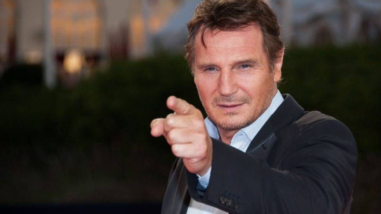 Actor Liam Neeson poses on the red carpet before the screening of his movie "Taken 2" during the 38th Deauville American Film Festival on September 7, 2012 in Deauville, France
