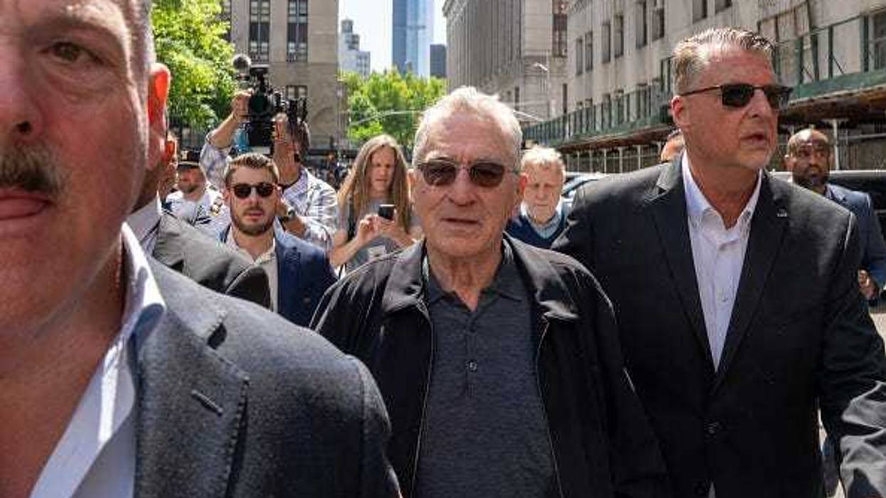 Actor Robert De Niro departs after speaking to the media in front of Manhattan Criminal Court on May 28, 2024 in New York City.