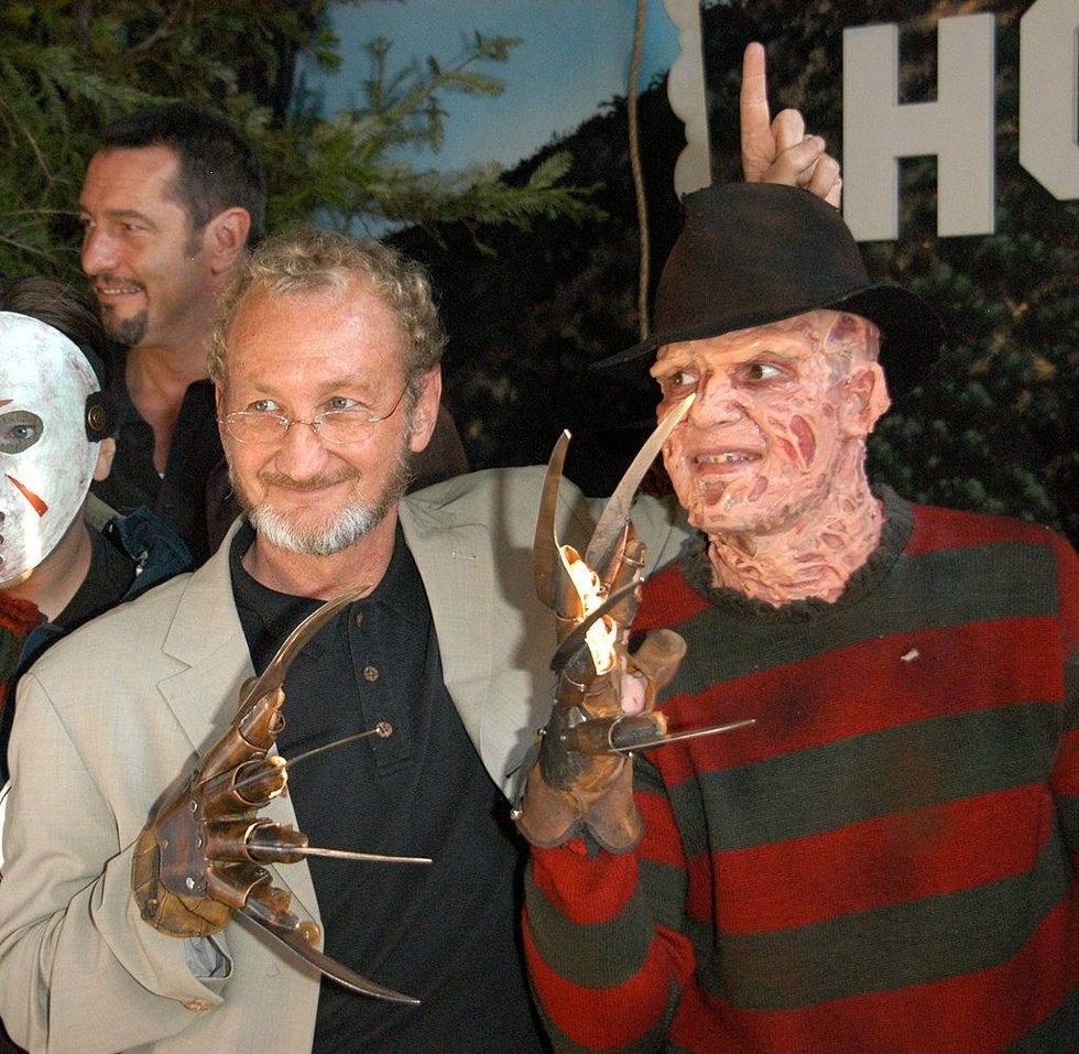 Actor Robert Englund poses with Freddy look-a-like winner at the Hollywood Wax Mueum for the debut of the DVD release of "Freddy Vs. Jason" on January 13, 2004 in Hollywood, California.