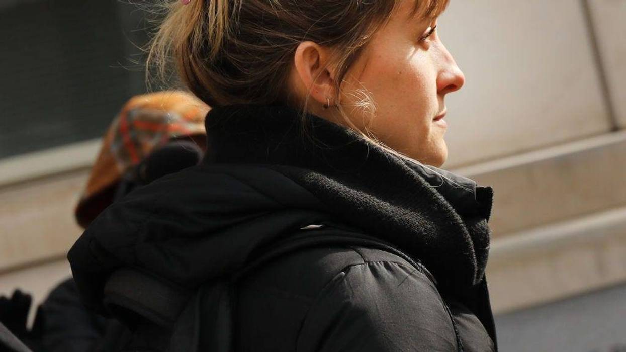 Actress Allison Mack leaves the Brooklyn Federal Courthouse with her lawyers after a court appearance surrounding the alleged sex cult NXIVM on February 06, 2019 in New York City.