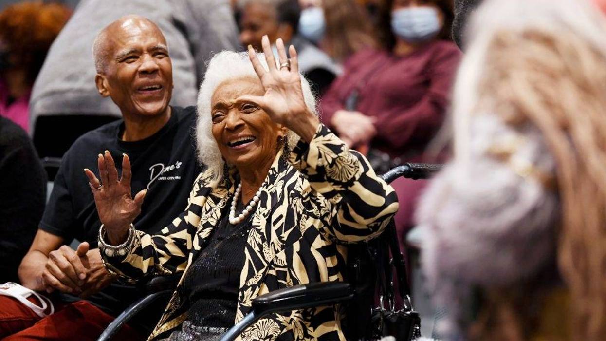 Actress Nichelle Nichols (R) and son Kyle Johnson attend the Nichelle Nichols Finale Celebration during 2021 Los Angeles Comic Con at Los Angeles Convention Center on December 05, 2021 in Los Angeles, California.