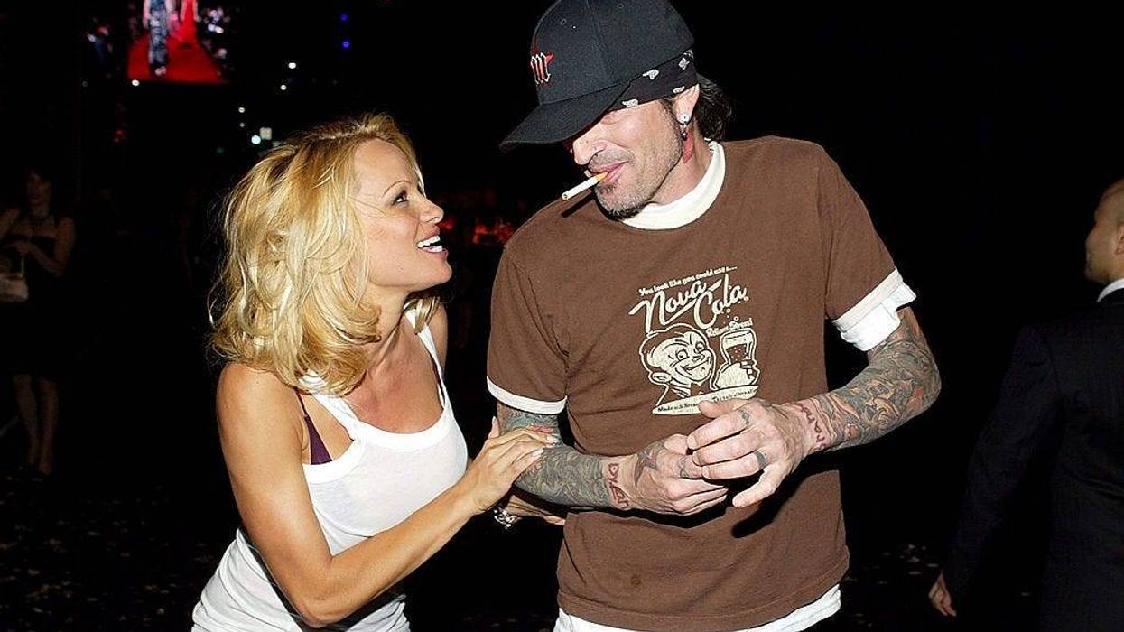 Actress Pamela Anderson (L) and Tommy Lee leave the 'Rodeo Walk of Style' Award on Rodeo Drive March 28, 2004 in Beverly Hills, California.