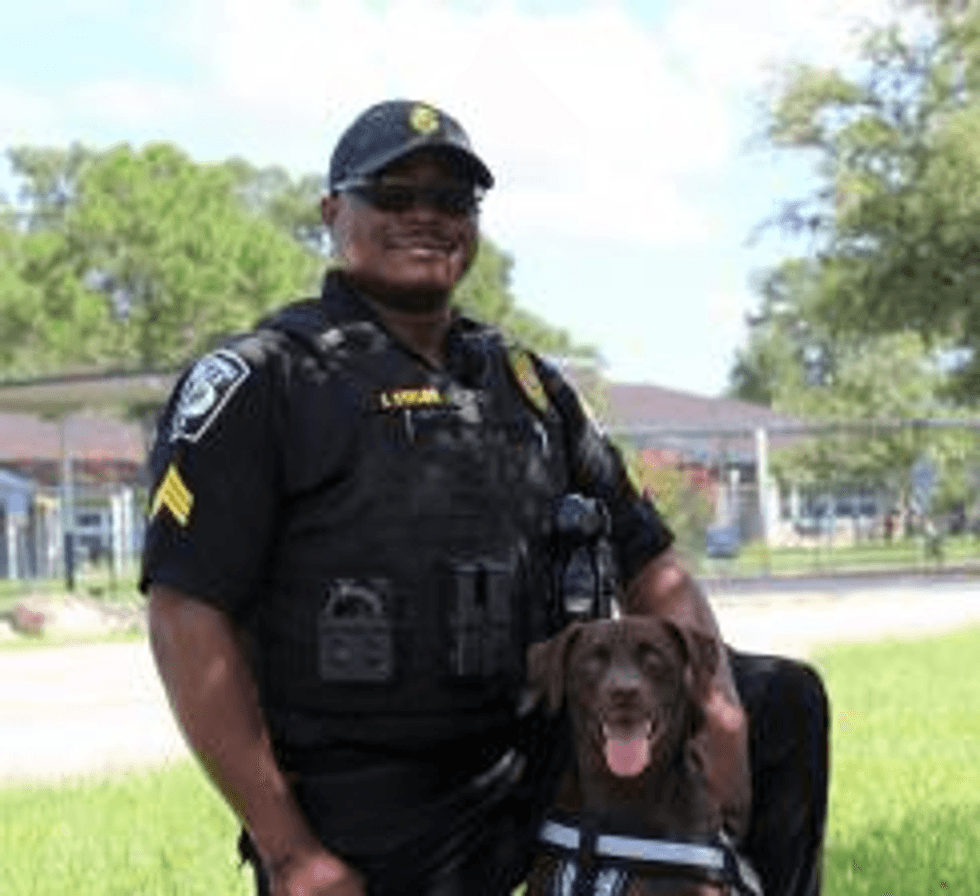 Administrative Sergeant Jason Taylor and K-9 Justice
