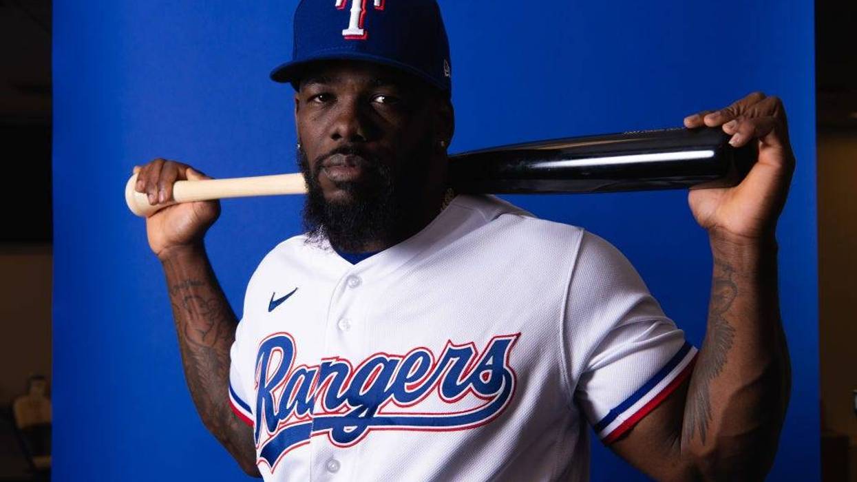Adolis García #53 of the Texas Rangers poses during Photo Day at Surprise Stadium on March 17, 2022 in Surprise, Arizona.