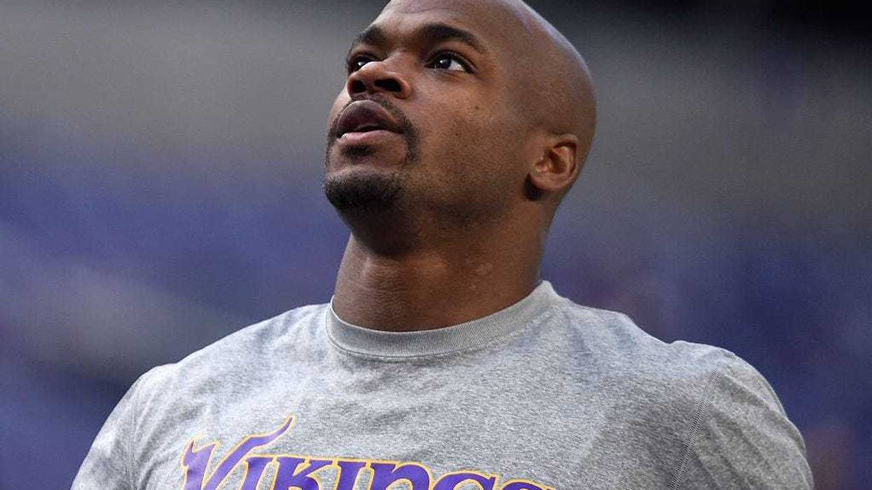 Adrian Peterson #28 of the Minnesota Vikings warms up before the game against the Indianapolis Colts on December 18, 2016 at US Bank Stadium in Minneapolis, Minnesota.