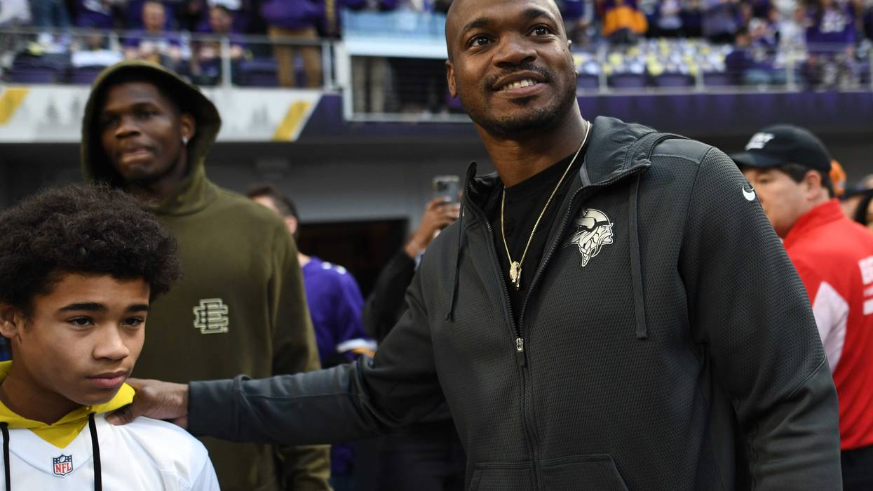Adrian Peterson is seen on the field prior to the NFC Wild Card playoff game between the New York Giants and the Minnesota Vikings at U.S. Bank Stadium on January 15, 2023 in Minneapolis, Minnesota.