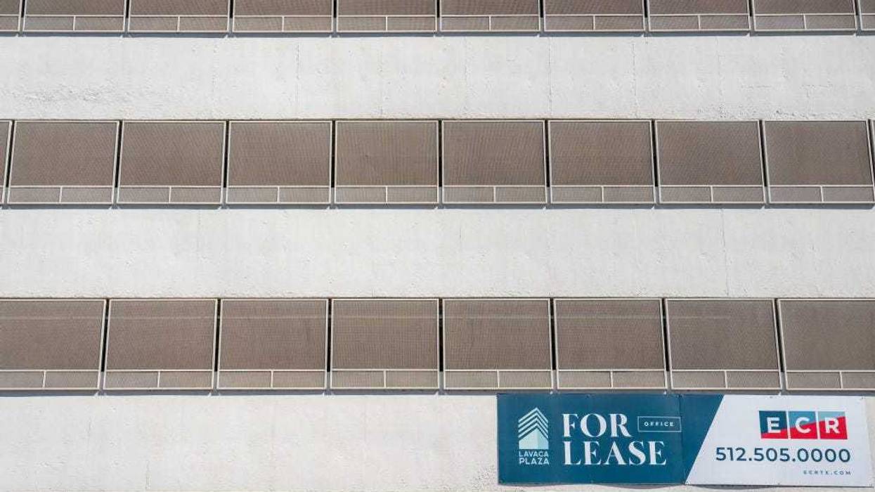 Advertisement for a building designated for office space is seen downtown on October 09, 2023 in Austin, Texas. An increase in empty office spaces around the country threatens to diminish U.S. business districts. (Photo by Brandon Bell/Getty Images)