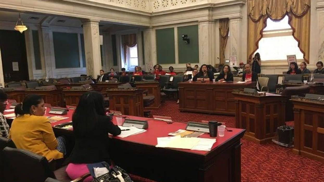 Advocate Erika Almirante, Janet Ginsberg of Community Legal Services and Allison Julian of the Domestic Workers Alliance testify.