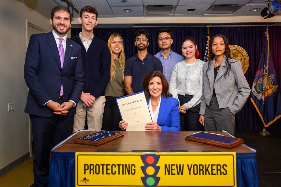 Advocates joined Hochul for the signing of the legislative package at her Midtown office on Wednesday