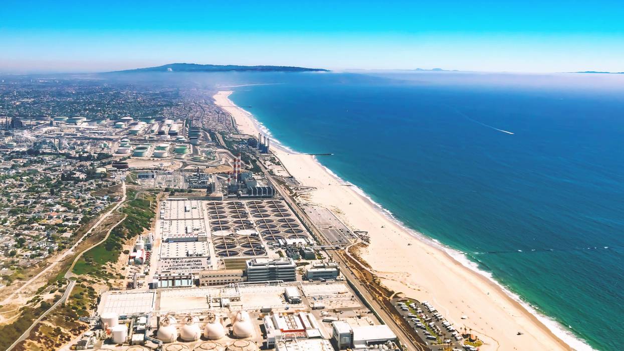 Aerial view of an oil refinery on the beach of El Segundo, Los Angeles, CA