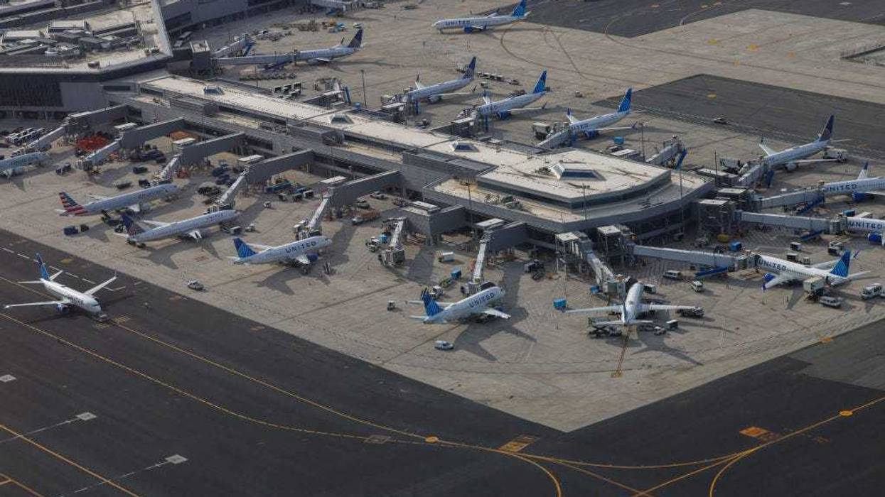 Aerial view of United Airlines passenger planes docked in a terminal of Newark Airport in Newark, New Jersey, on May 11, 2024.