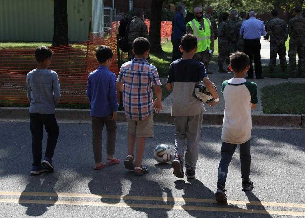 Afghan children play soccer