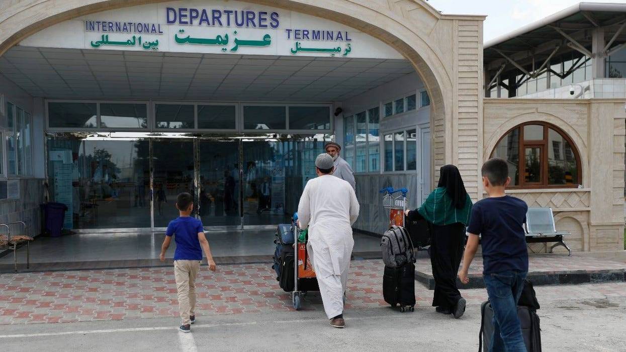 Afghan woman in limbo at Kabul airport after Taliban sweep