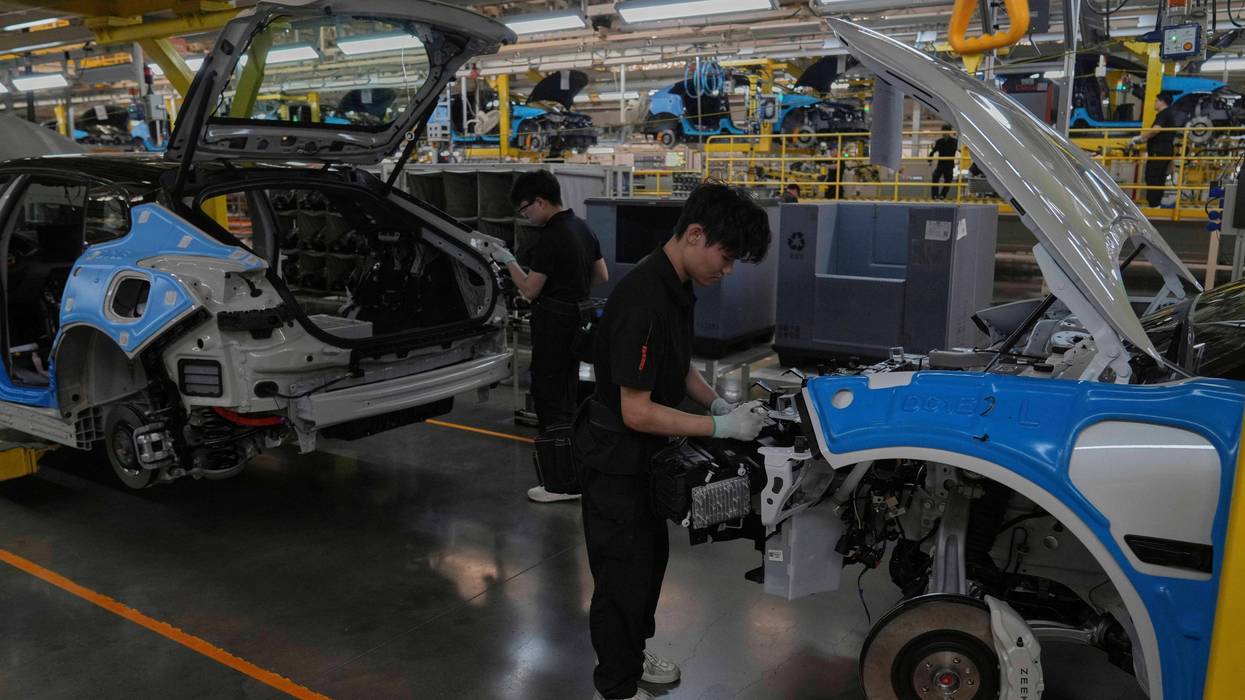 ÁFRICA-CHINA-VEHÍCULOS ELÉCTRICOS 6724