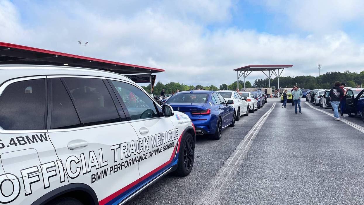After the lecture, kids get into vehicles preparing to head onto the track and skid-pad at the BMW Performance Driving Center to practice what they learned