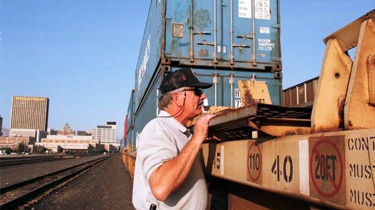 Agent looking for stolen contents on a train