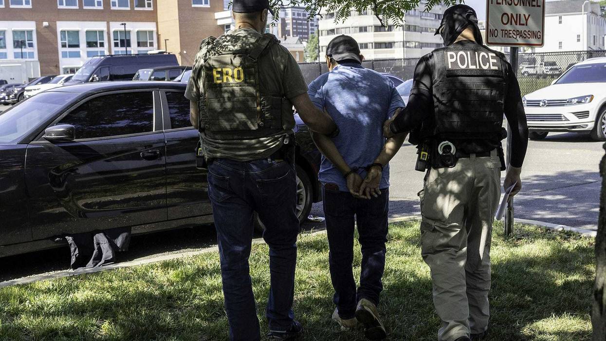 Agents from Immigration and Customs Enforcement detain an immigrant after a court hearing at the Connecticut Superior Court in Stamford, Connecticut, on July 3