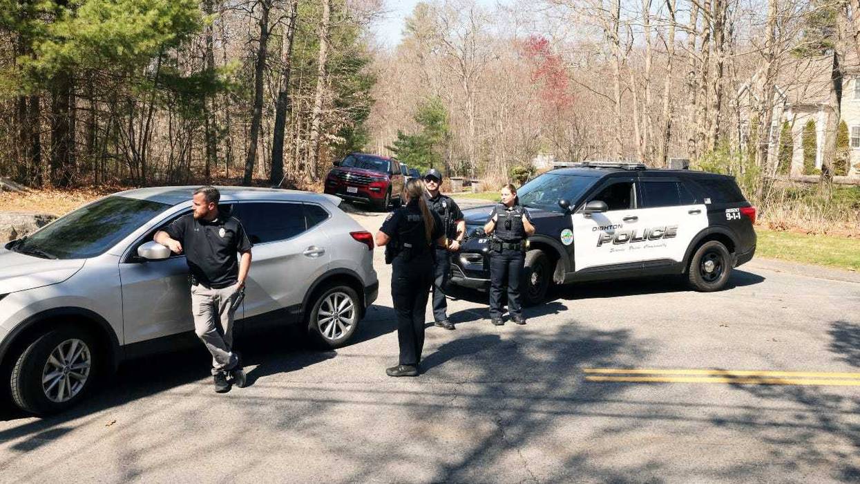 Agents swarm a home in Massachusetts, on Thursday, April 13, 2023, where they detained Mass. Air National Guardsman Jack Teixeira, who is suspected of leaking classified documents.