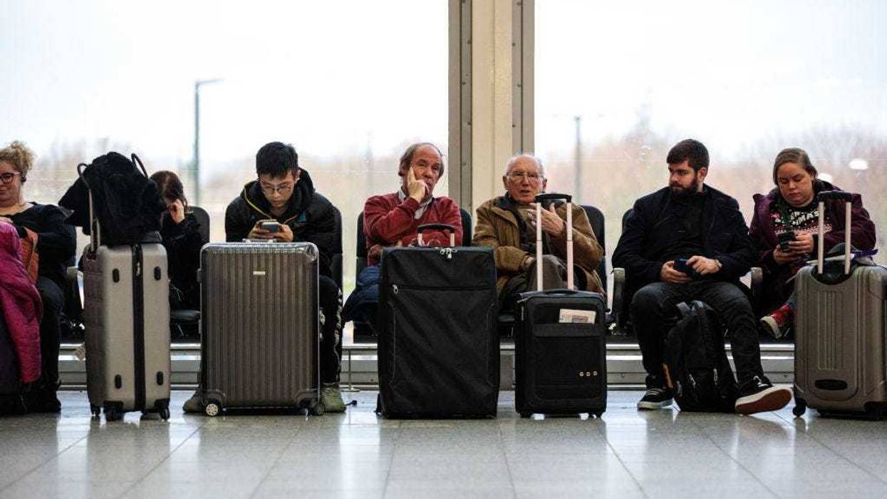 airline passengers wait for delays